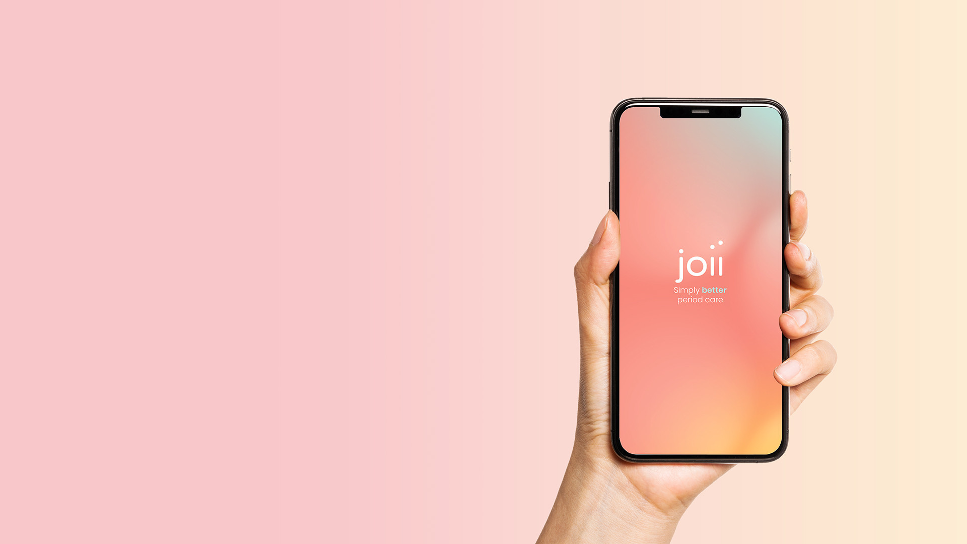 Gradient pink background. Hand holding a smartphone displaying the Joii app home screen